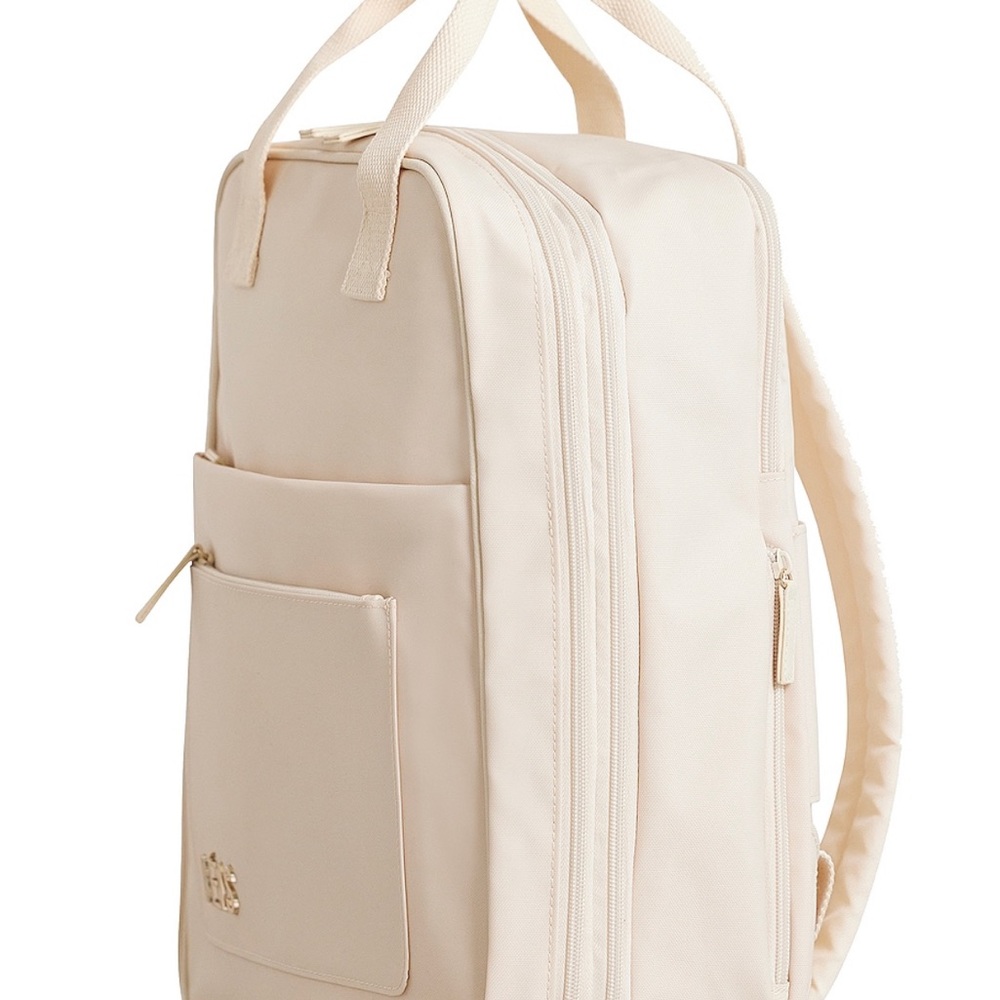 Beis the expandable backpack in beige